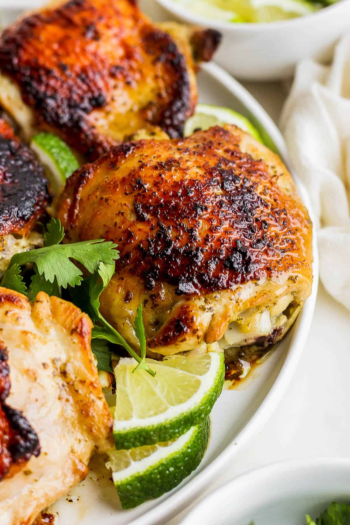 Juicy and tender cilantro lime chicken with crispy golden brown skin ready to be served.
