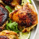 Cilantro Lime Chicken with a golden crispy skin on a plate.
