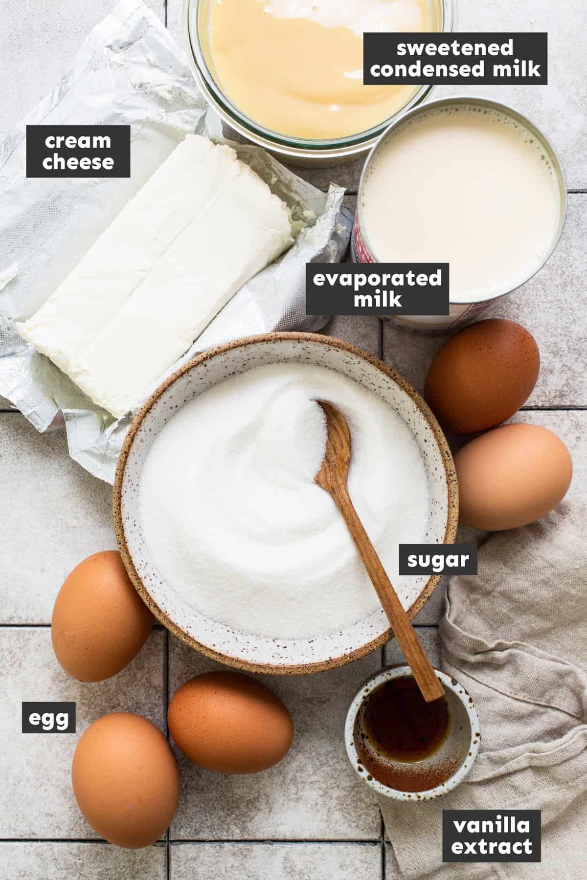 Ingredients in flan de queso on a table.