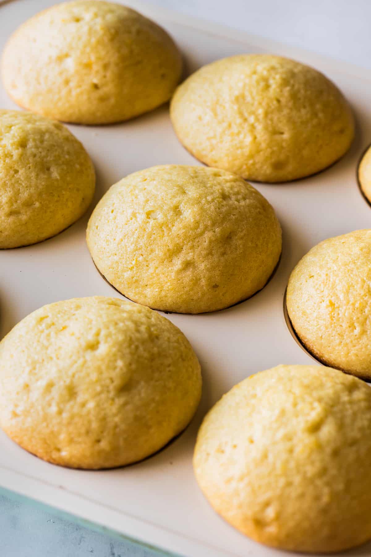 Mantecadas in a muffin tin.