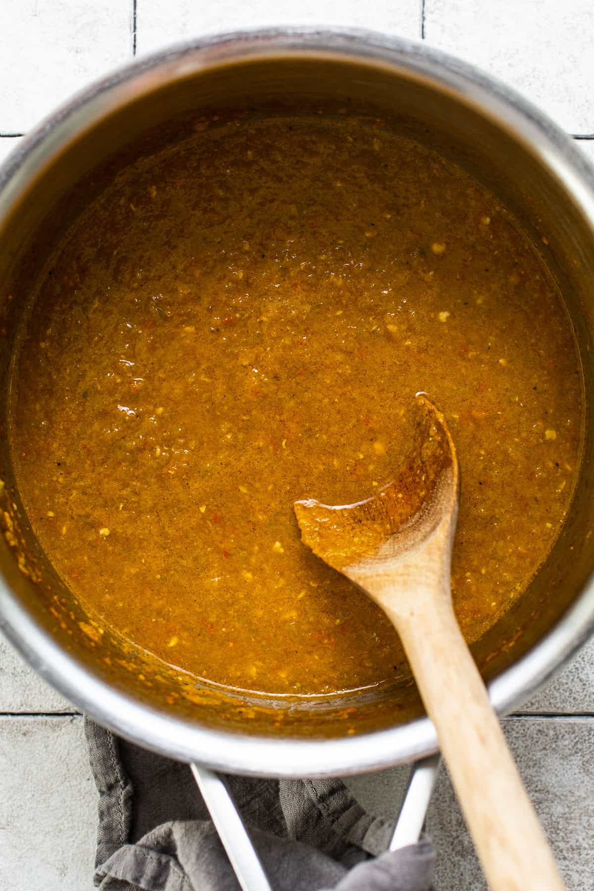 Cooked salsa mexicana in a saucepan.