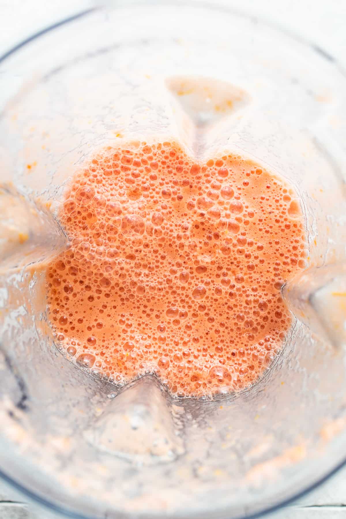 Blended tomato broth in a blender.