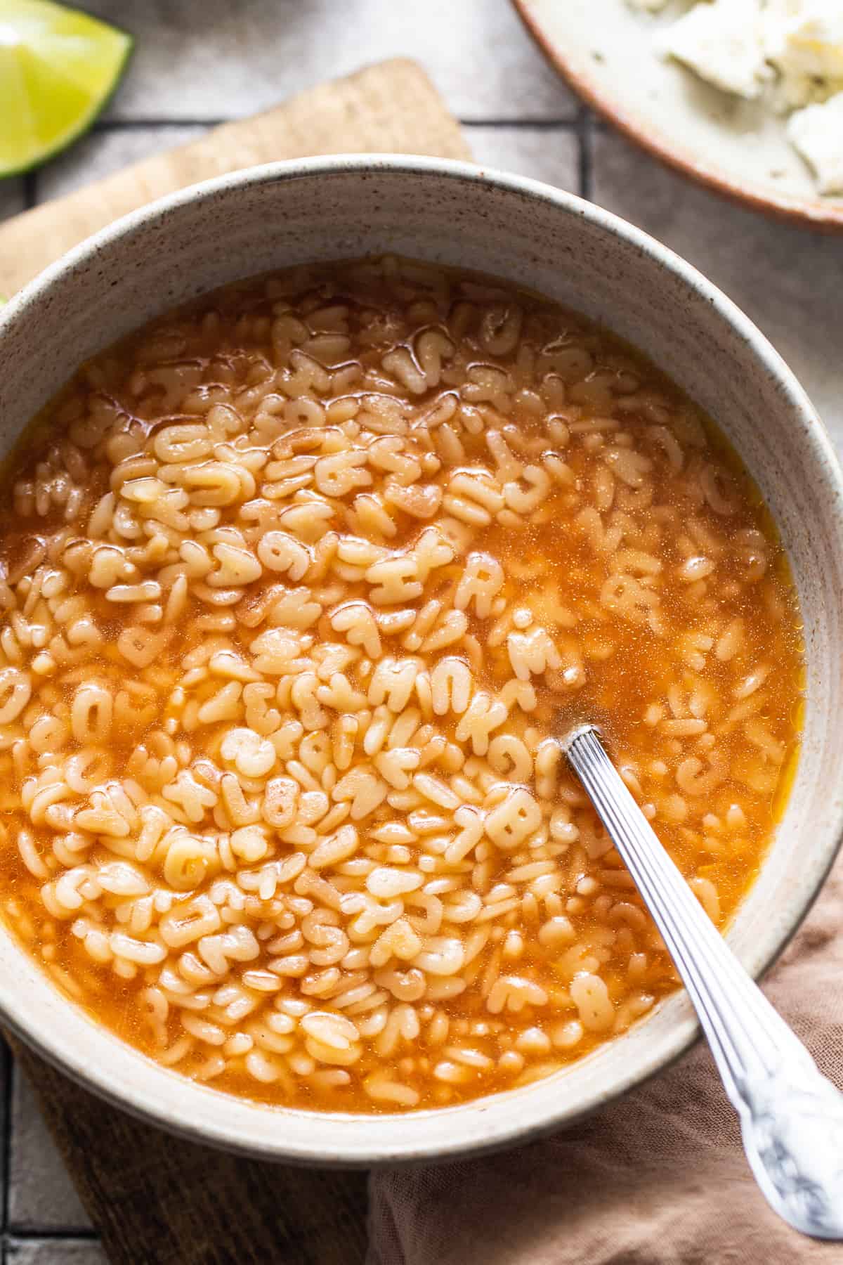 Sopa de letras in a light tomato broth.