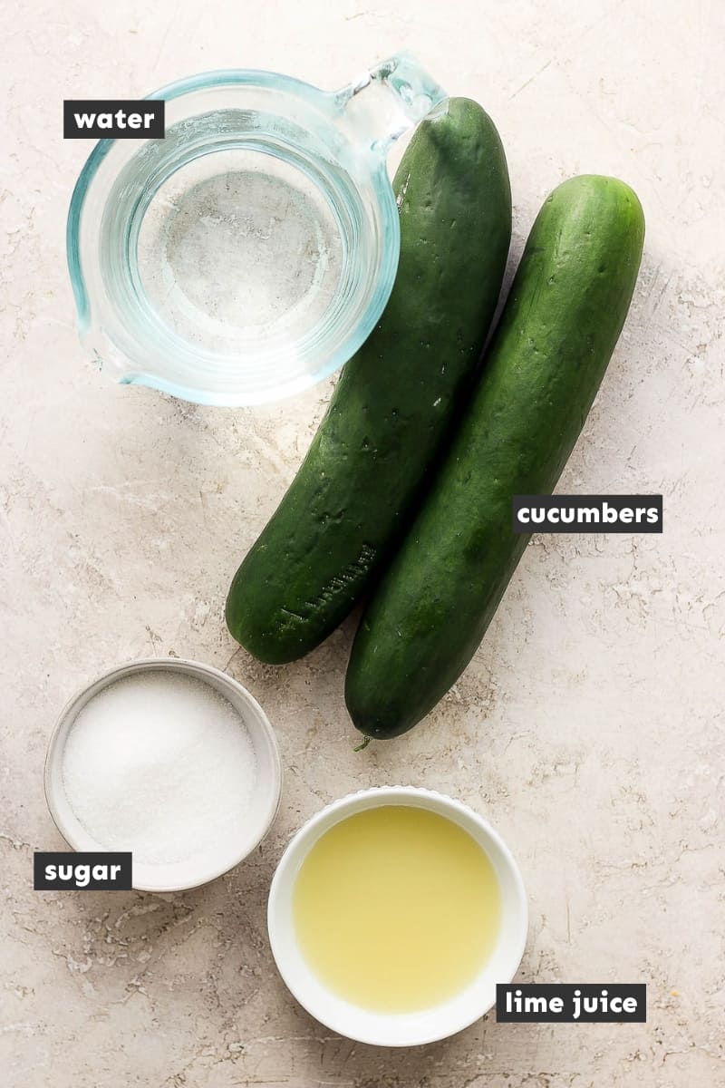 Ingredients in agua de pepino on a table.