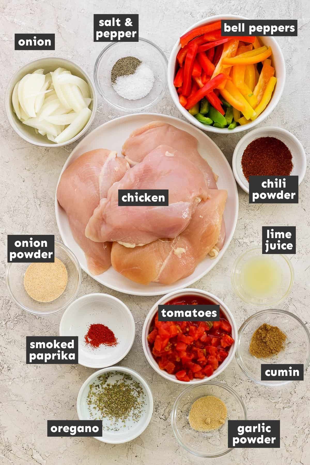 Ingredients in crockpot chicken fajitas on a table.