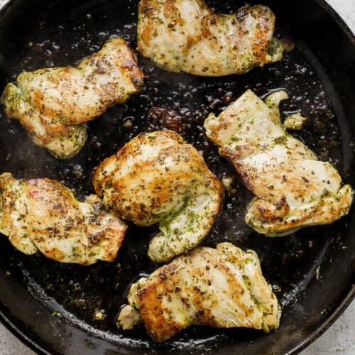 Cooked chimichurri chicken in a skillet.