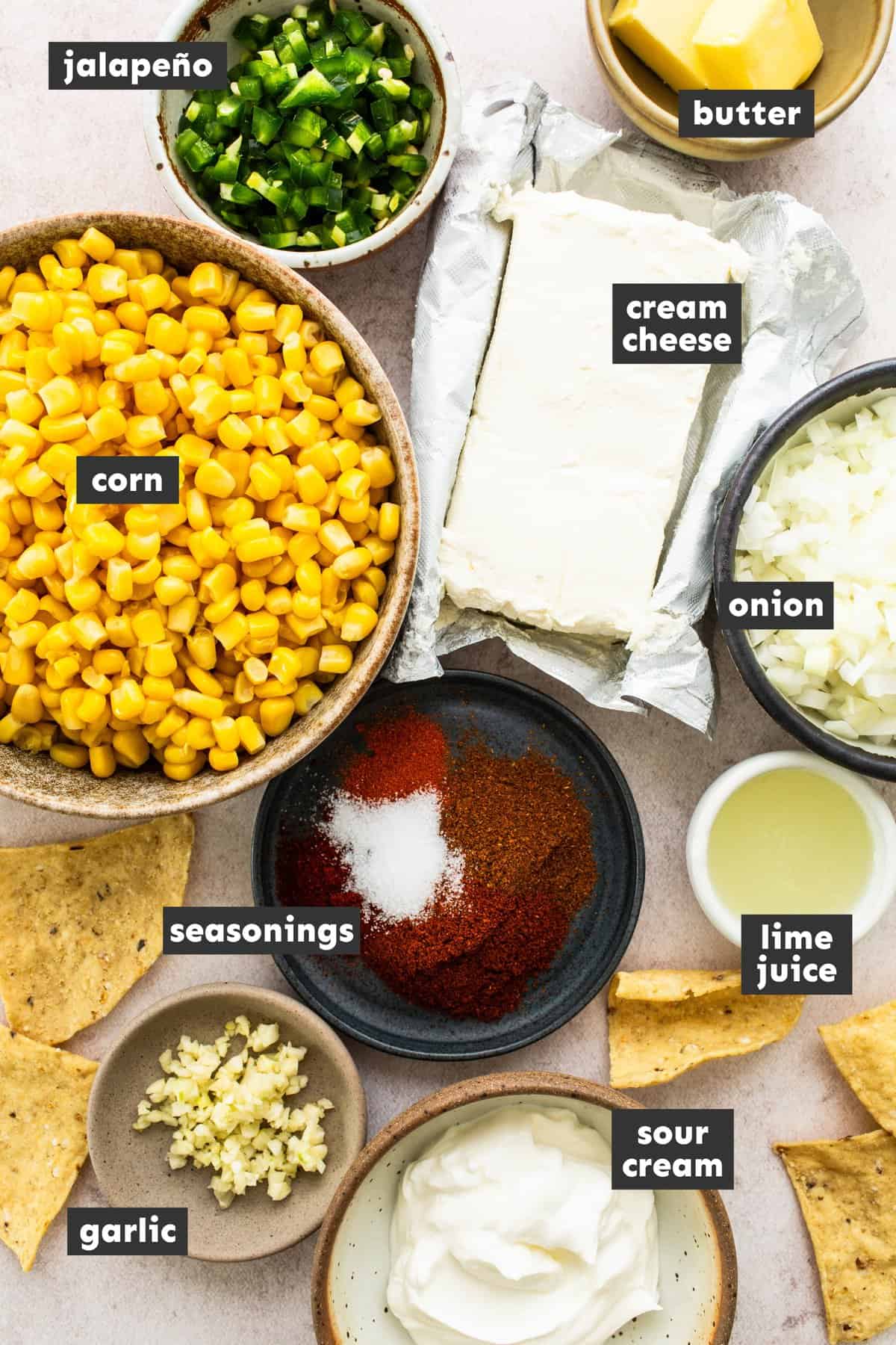 Ingredients for Mexican corn dip on a table.