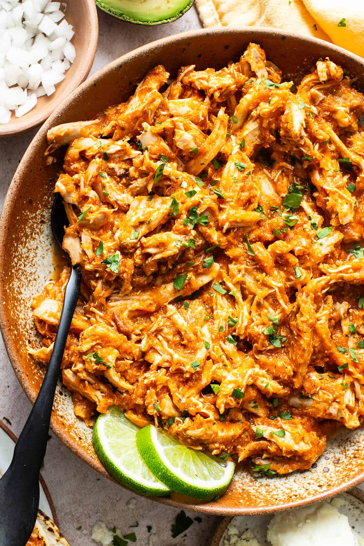 Chicken tinga topped with chopped cilantro.