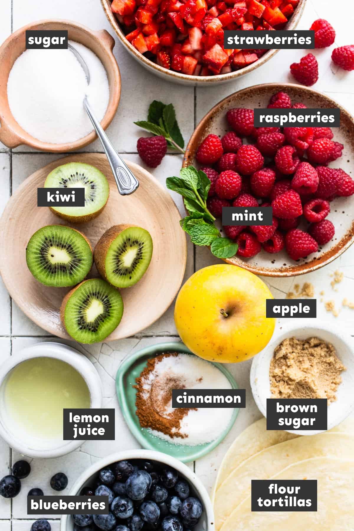 Fruit salsa ingredients on a table.