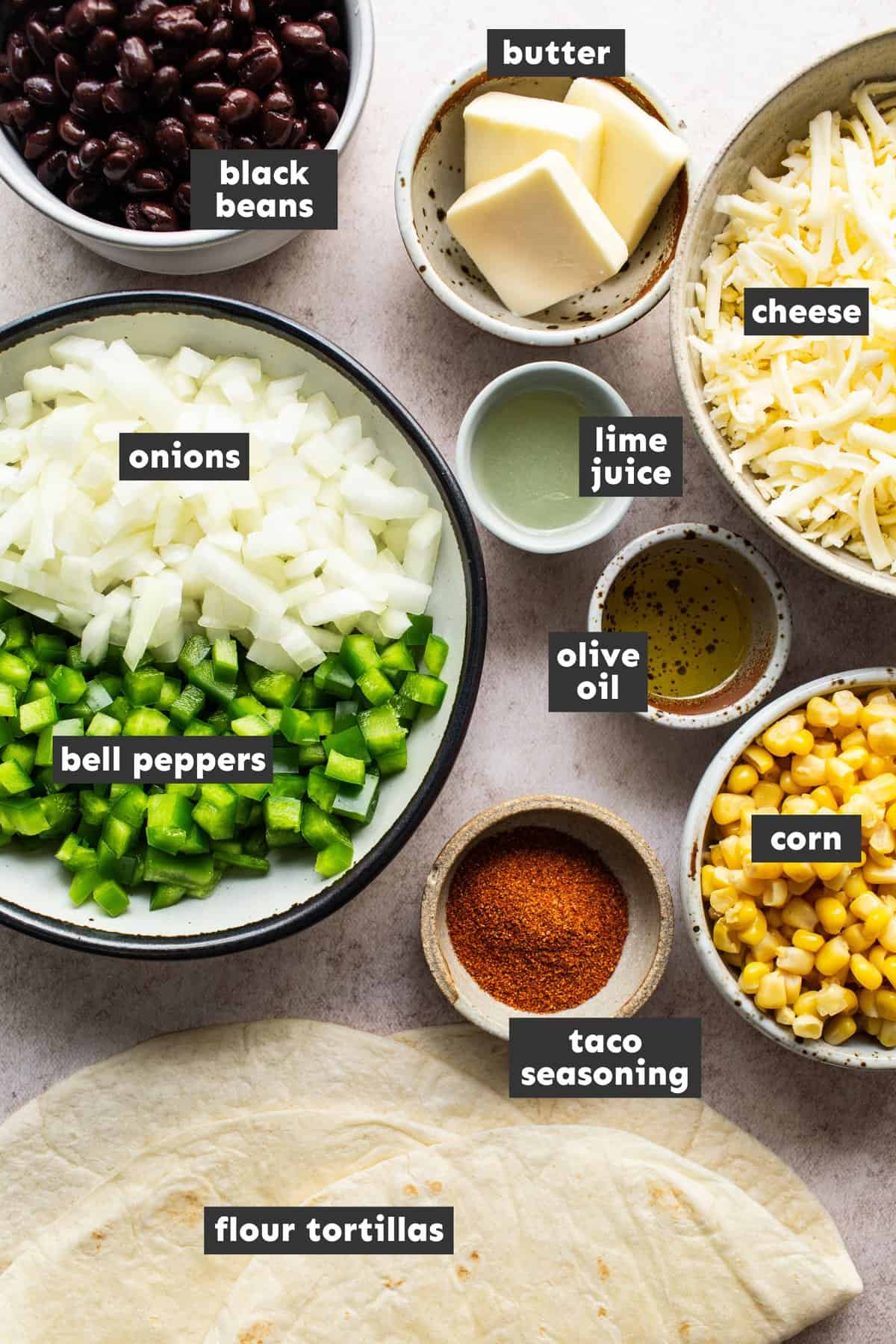 Ingredients for black bean quesadillas on a table.