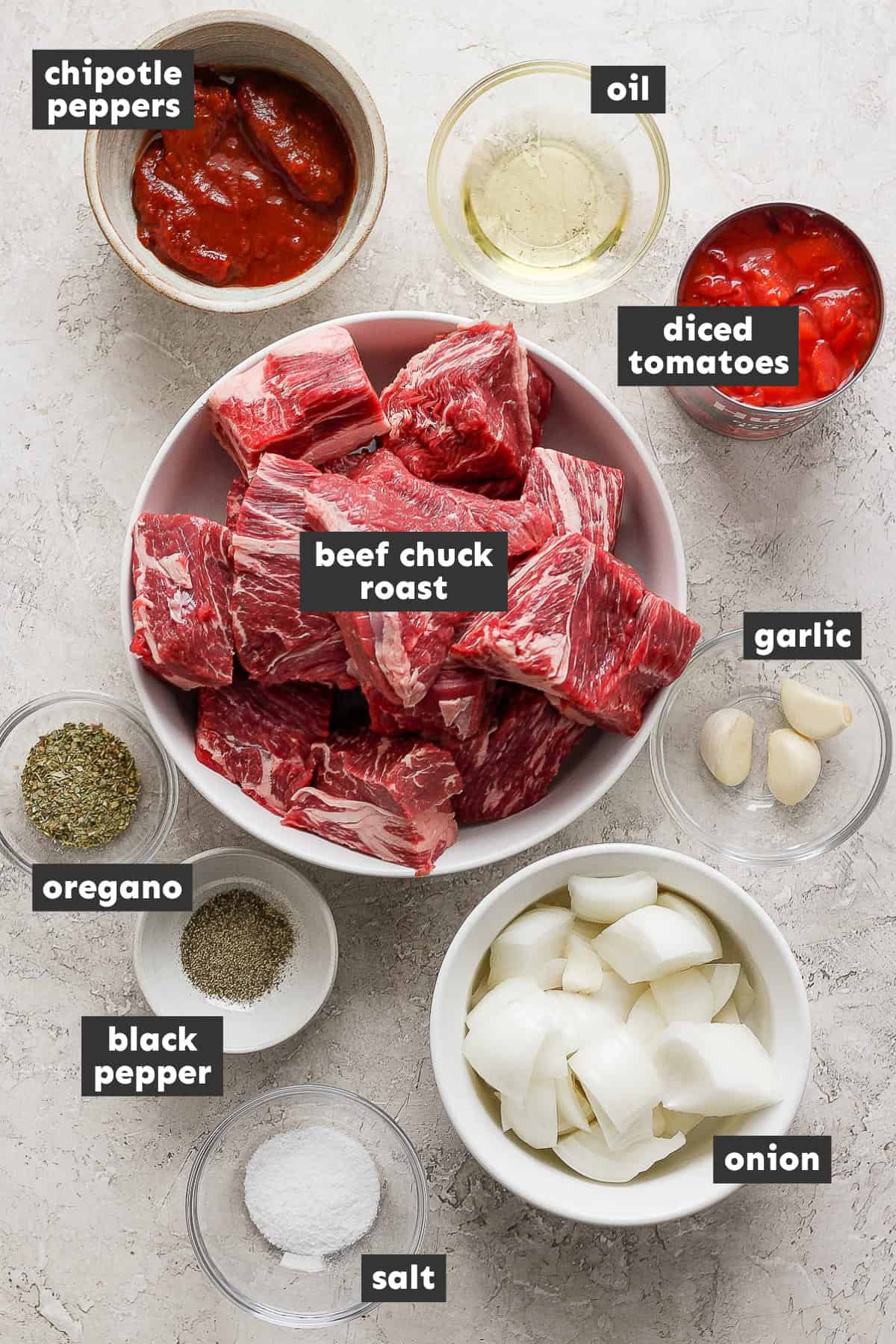 Beef tinga ingredients separated and measured out into mixing bowls
