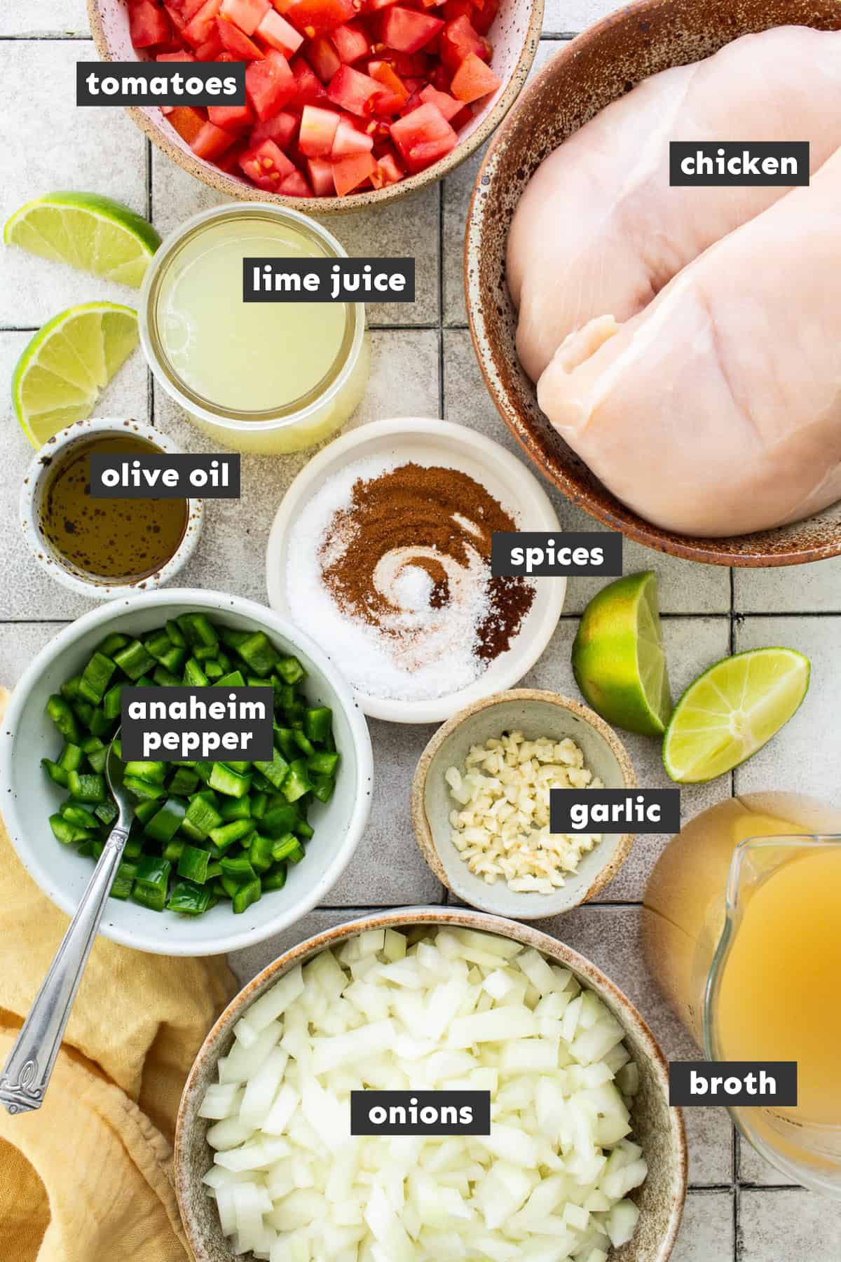 Sopa de lima ingredients measured out and separated into bowls.