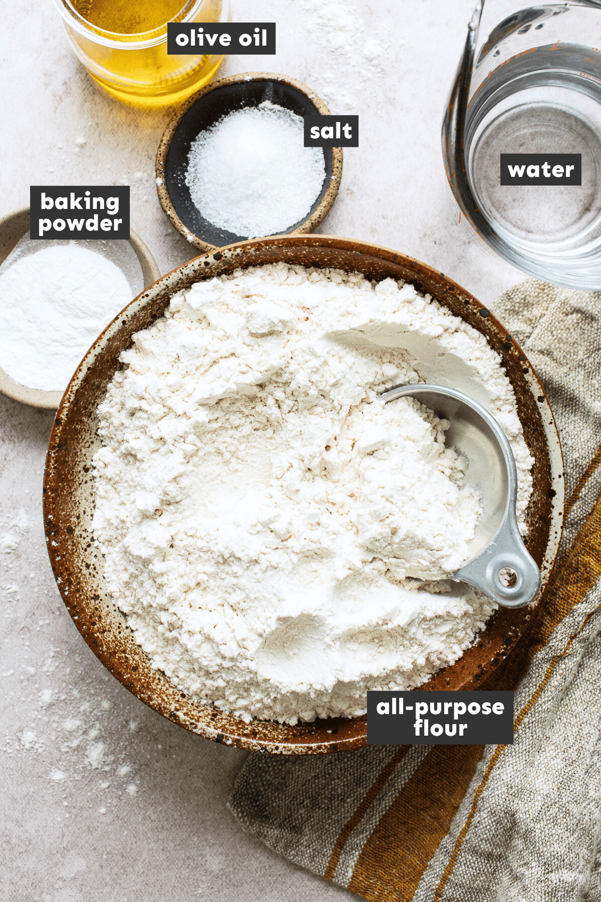 Flour tortilla ingredients separated into mixing bowls