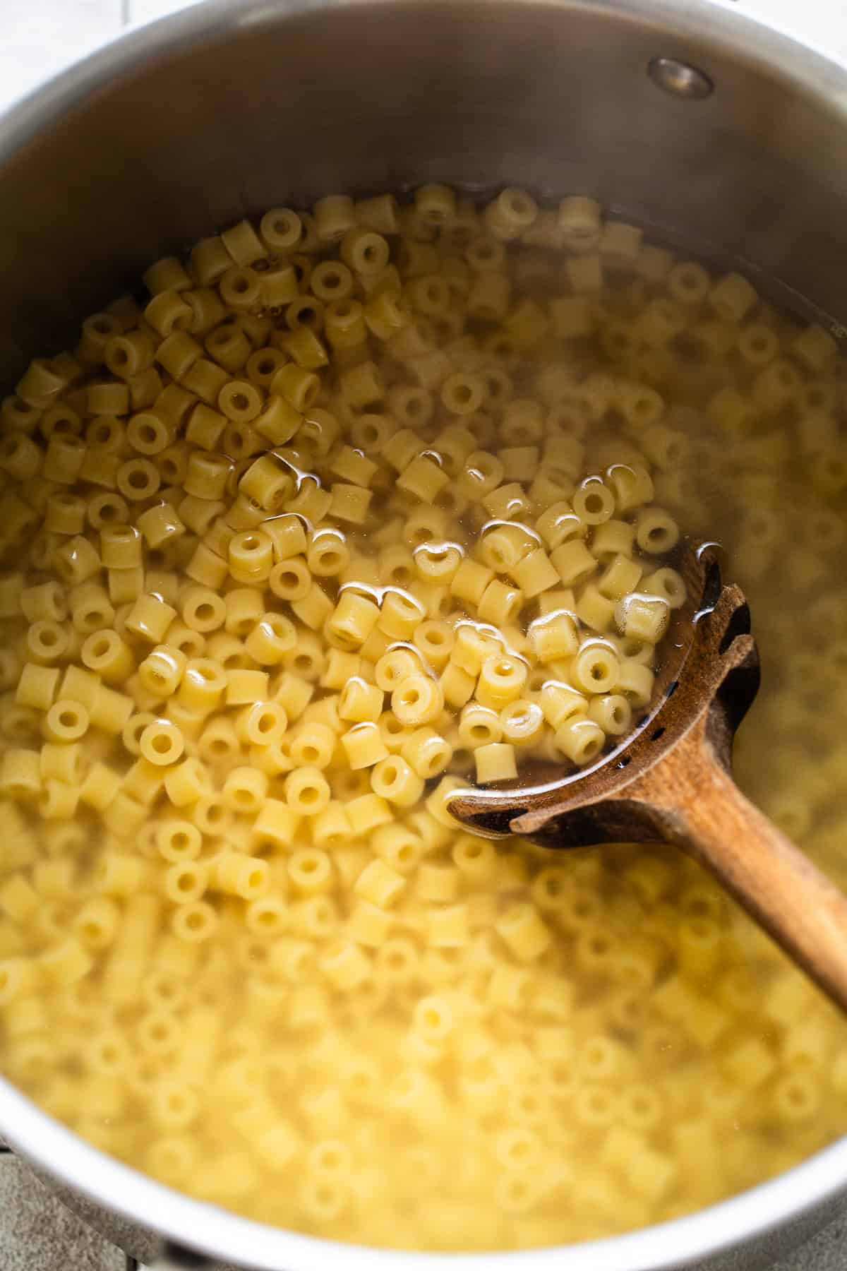 Cooked ditalini pasta in a pot to make street corn pasta salad.