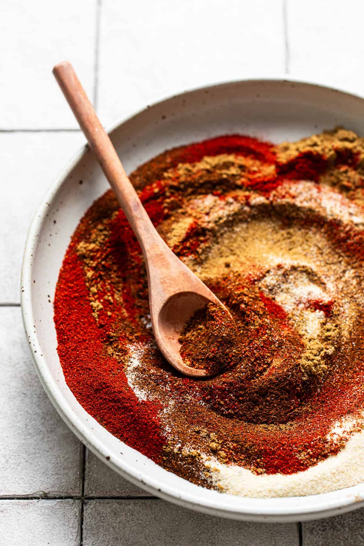 All seasonings poured into a large bowl.