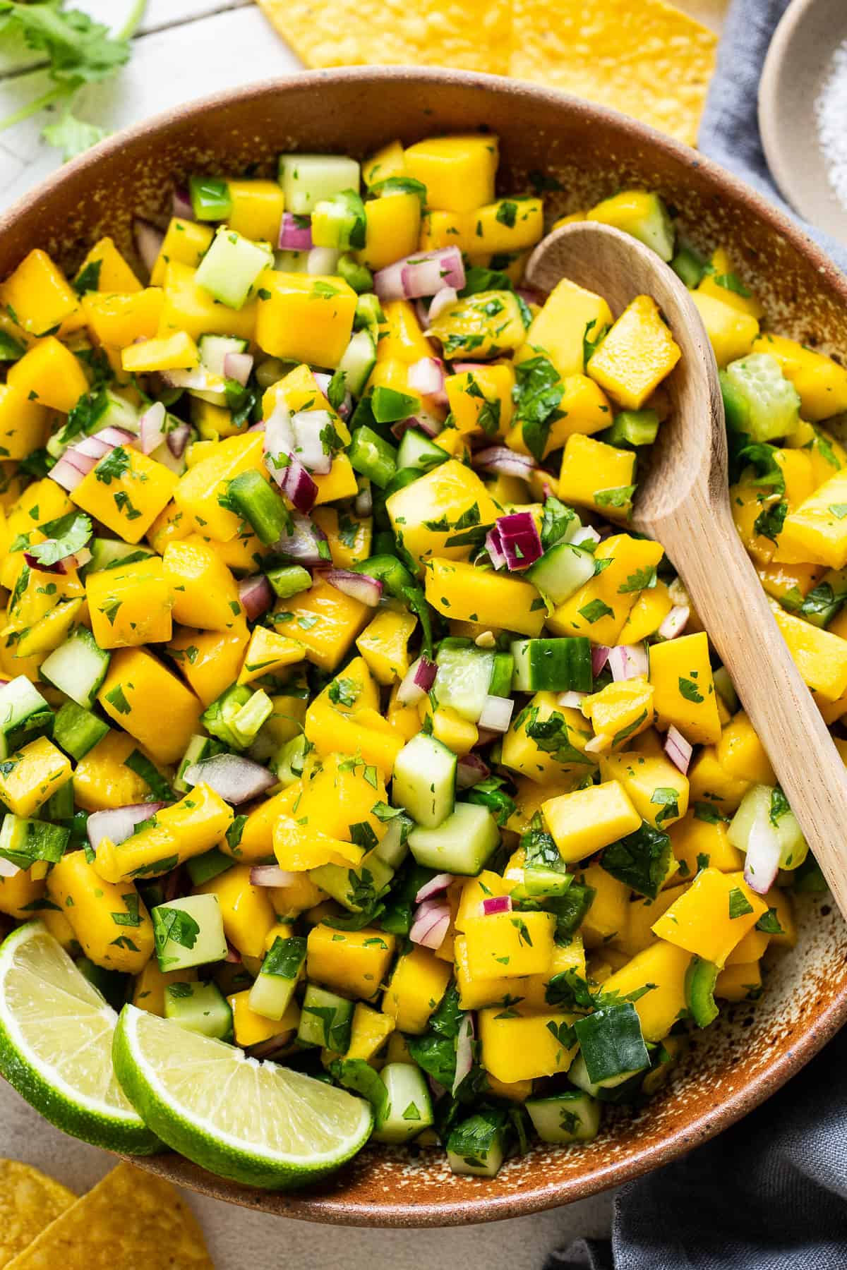 Mango salsa ready to eat in a large serving board