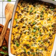 A crescent roll breakfast casserole in a baking dish ready to be served.