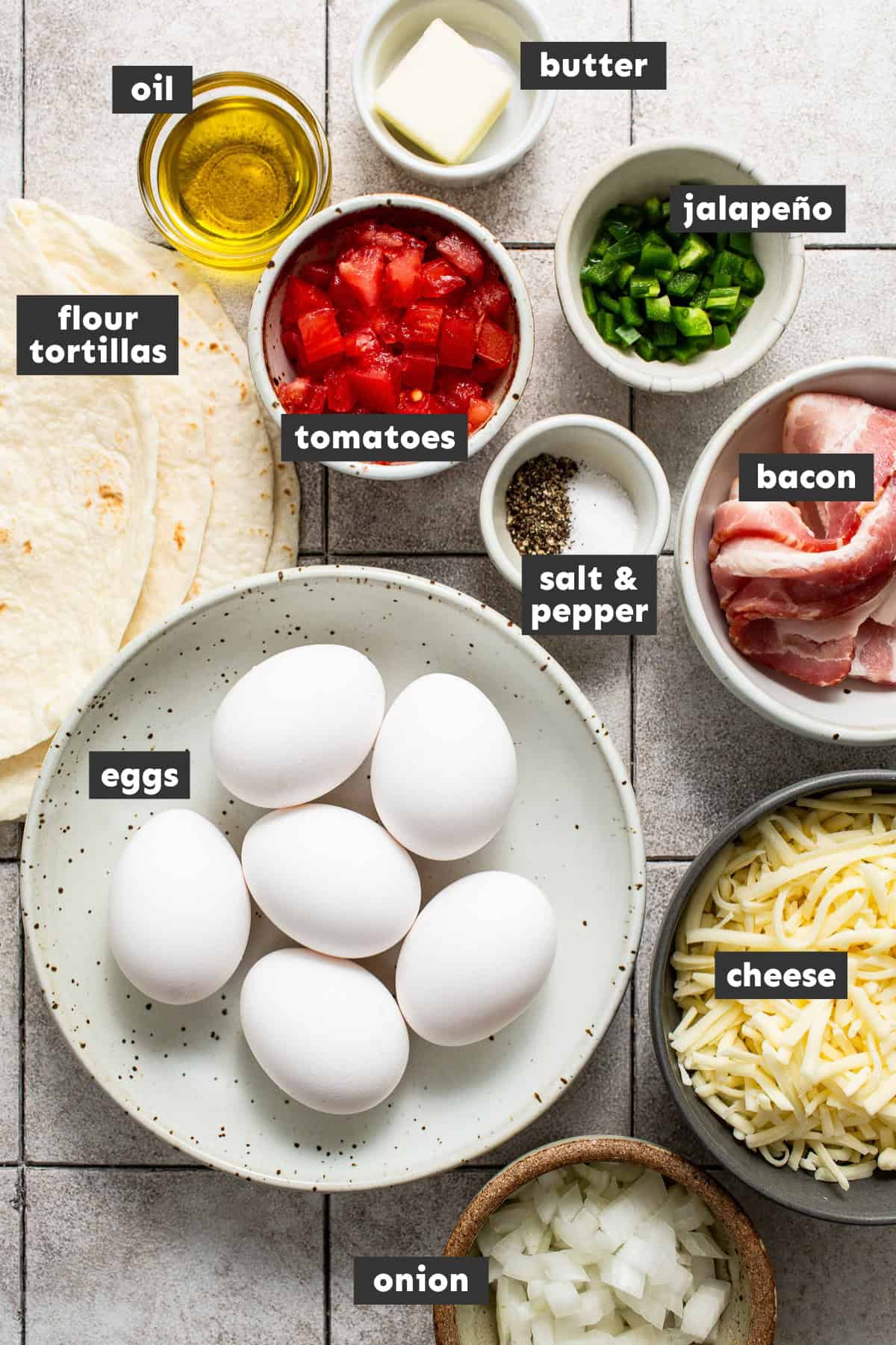 Ingredients for breakfast quesadillas on a table.