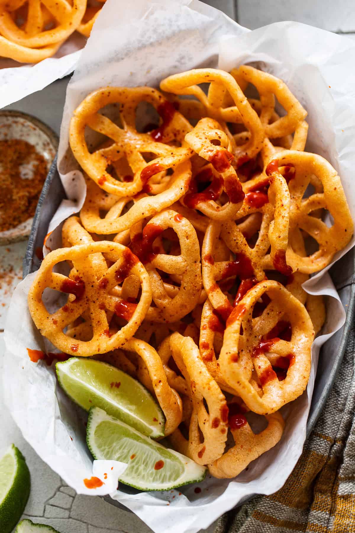 Duros aka chicharrones de harina with hot sauce and lime juice.