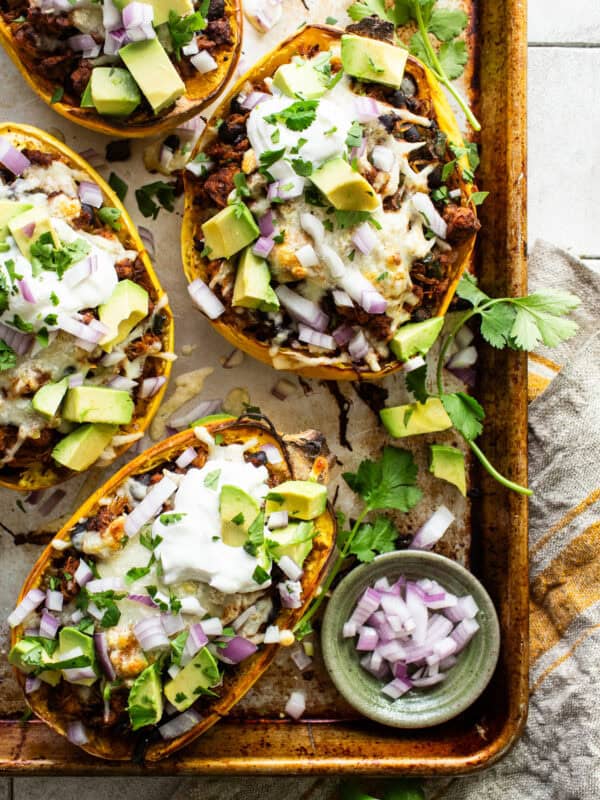 Stuffed spaghetti squash with ground chicken and black beans ready to serve.