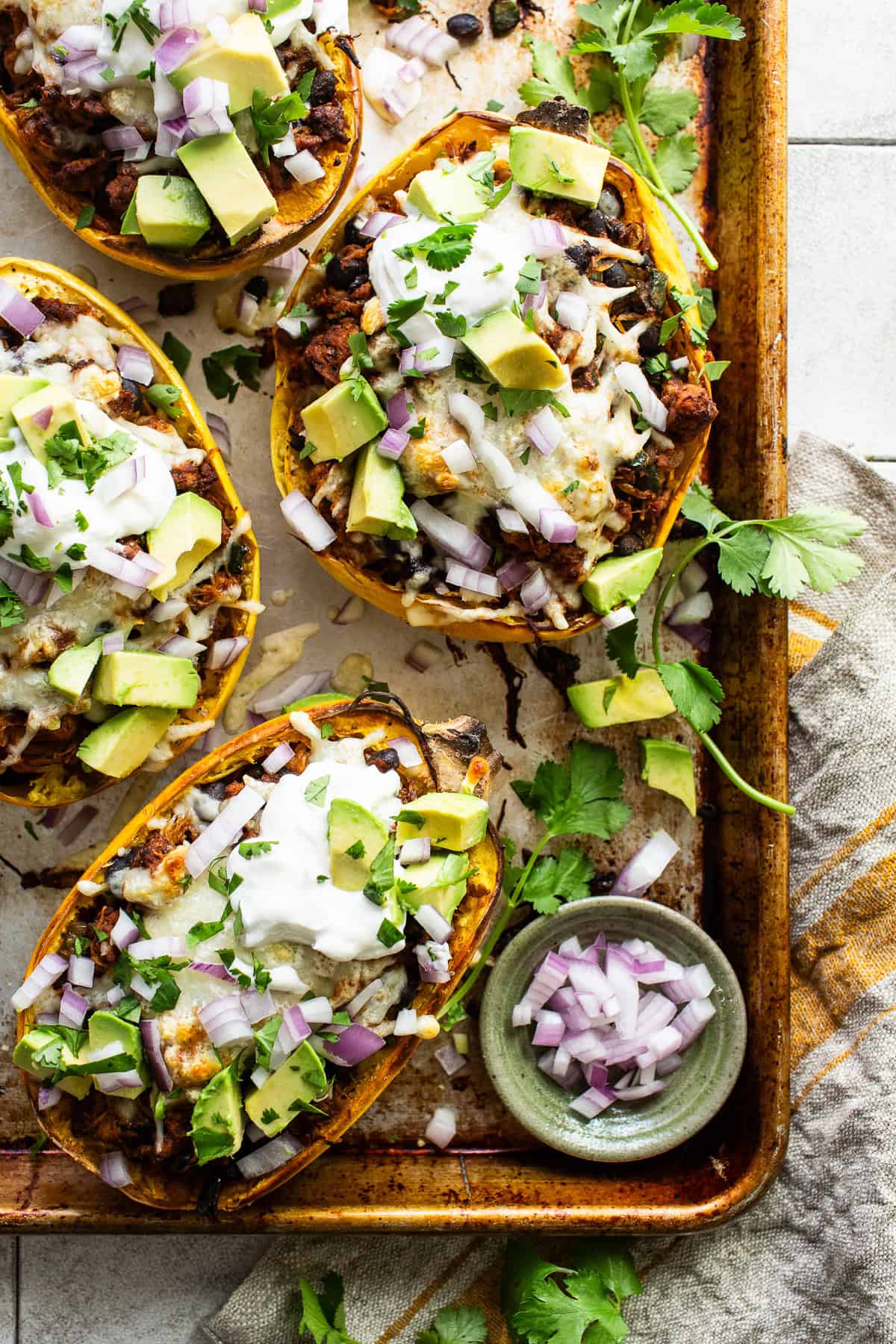Stuffed spaghetti squash with ground chicken and black beans ready to serve.