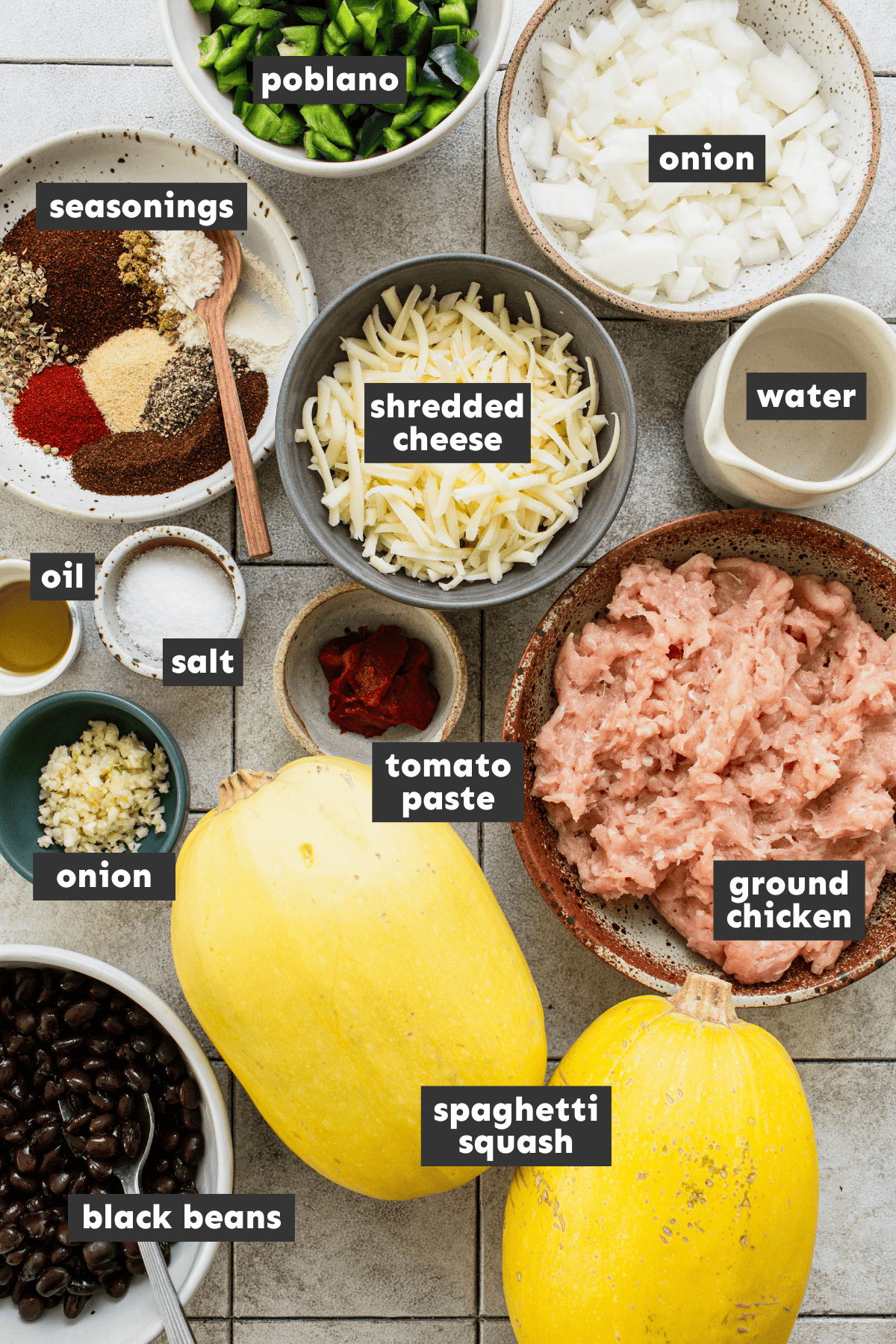 Ingredients for stuffed spaghetti squash on a table.