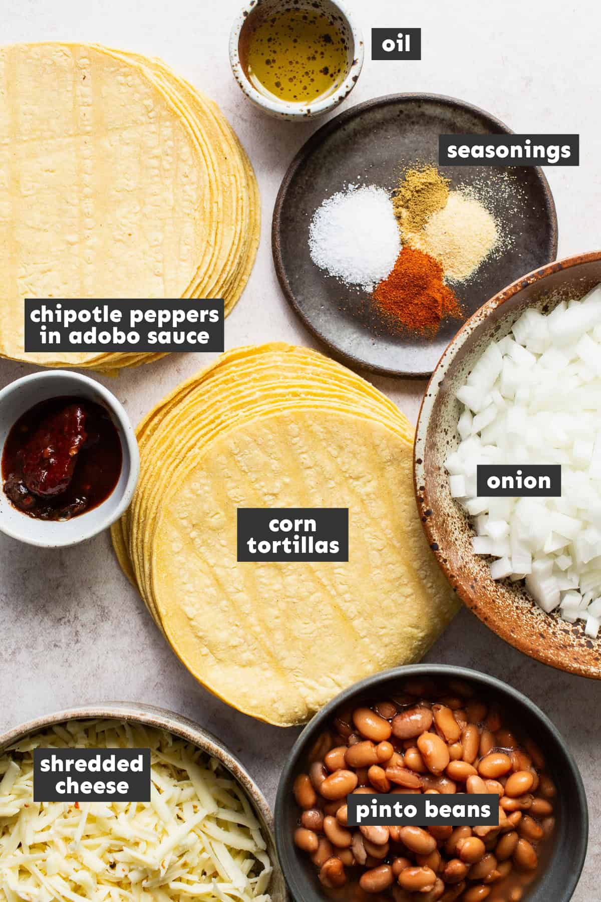 Ingredients for bean and cheese taquitos on a table.