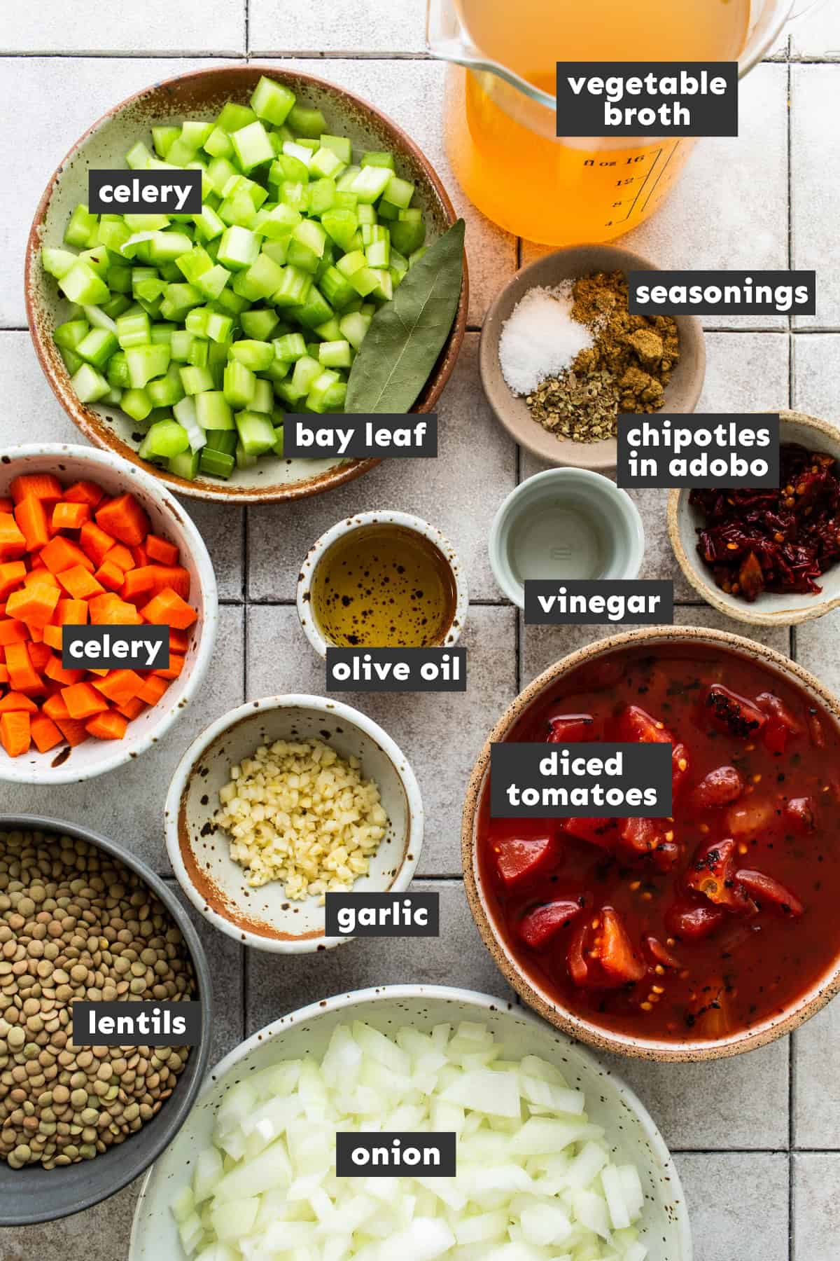 Ingredients for slow cooker lentil soup on a table.