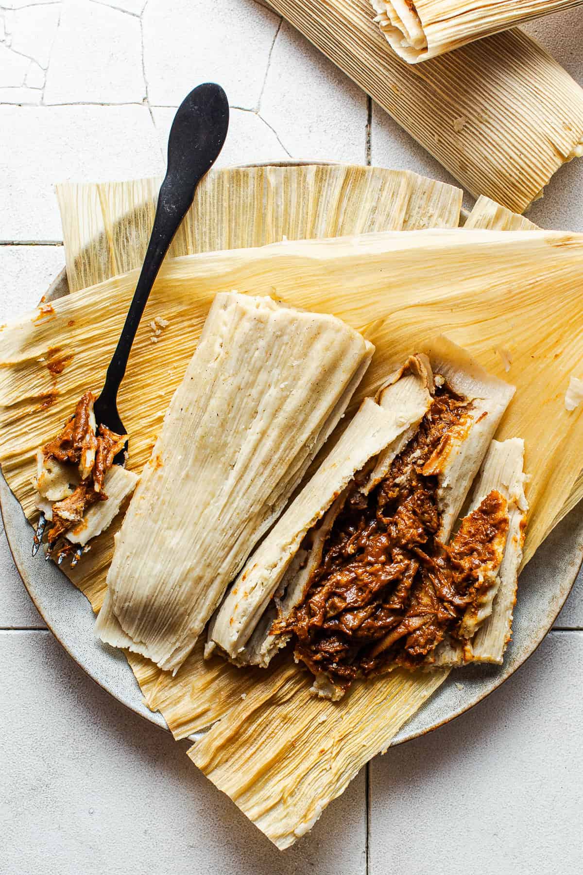 Tamales de Mole on a plate