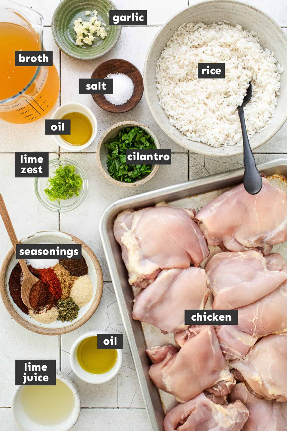 Ingredients for chicken burrito bowls on a table.