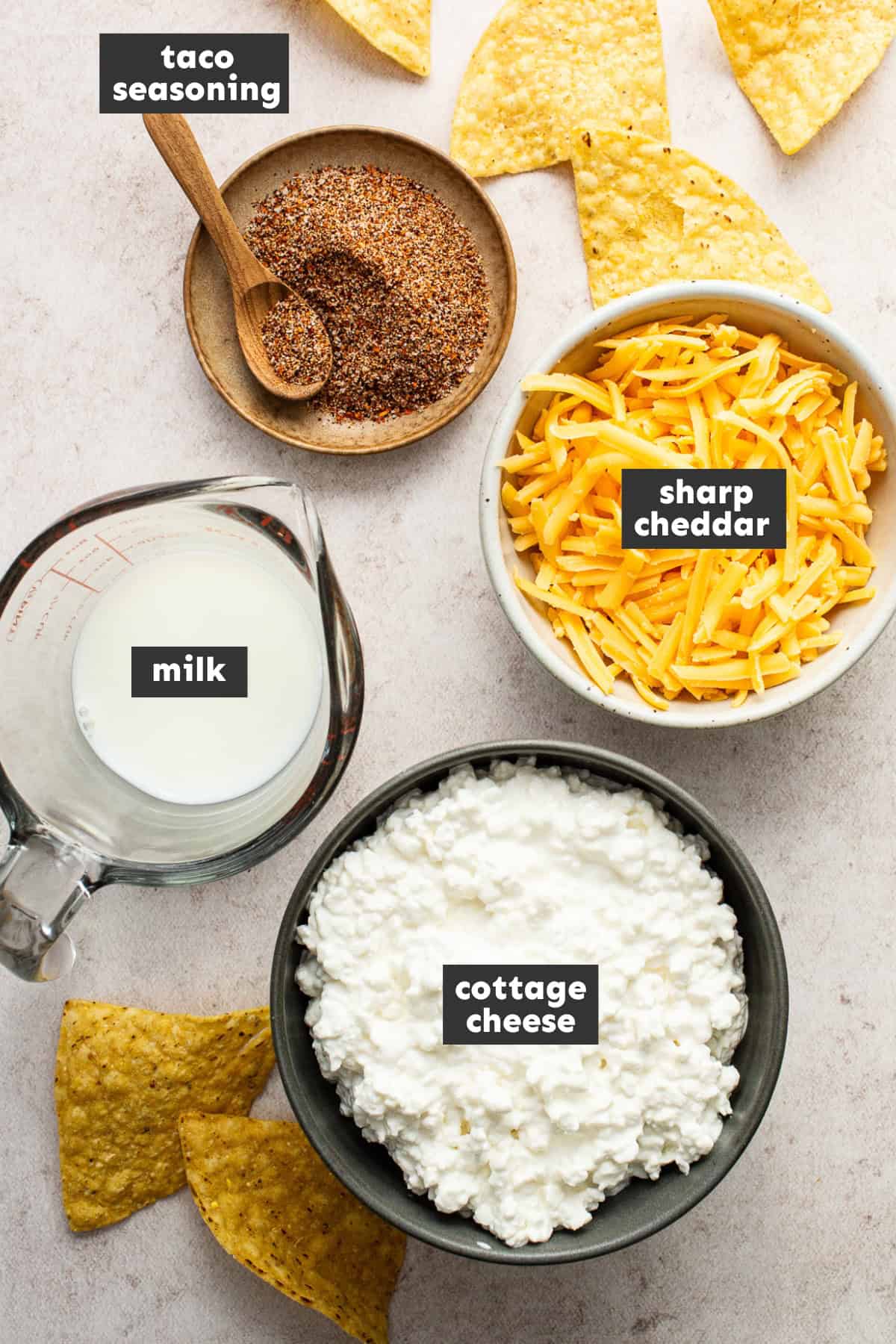 Ingredients in cottage cheese queso on a table.