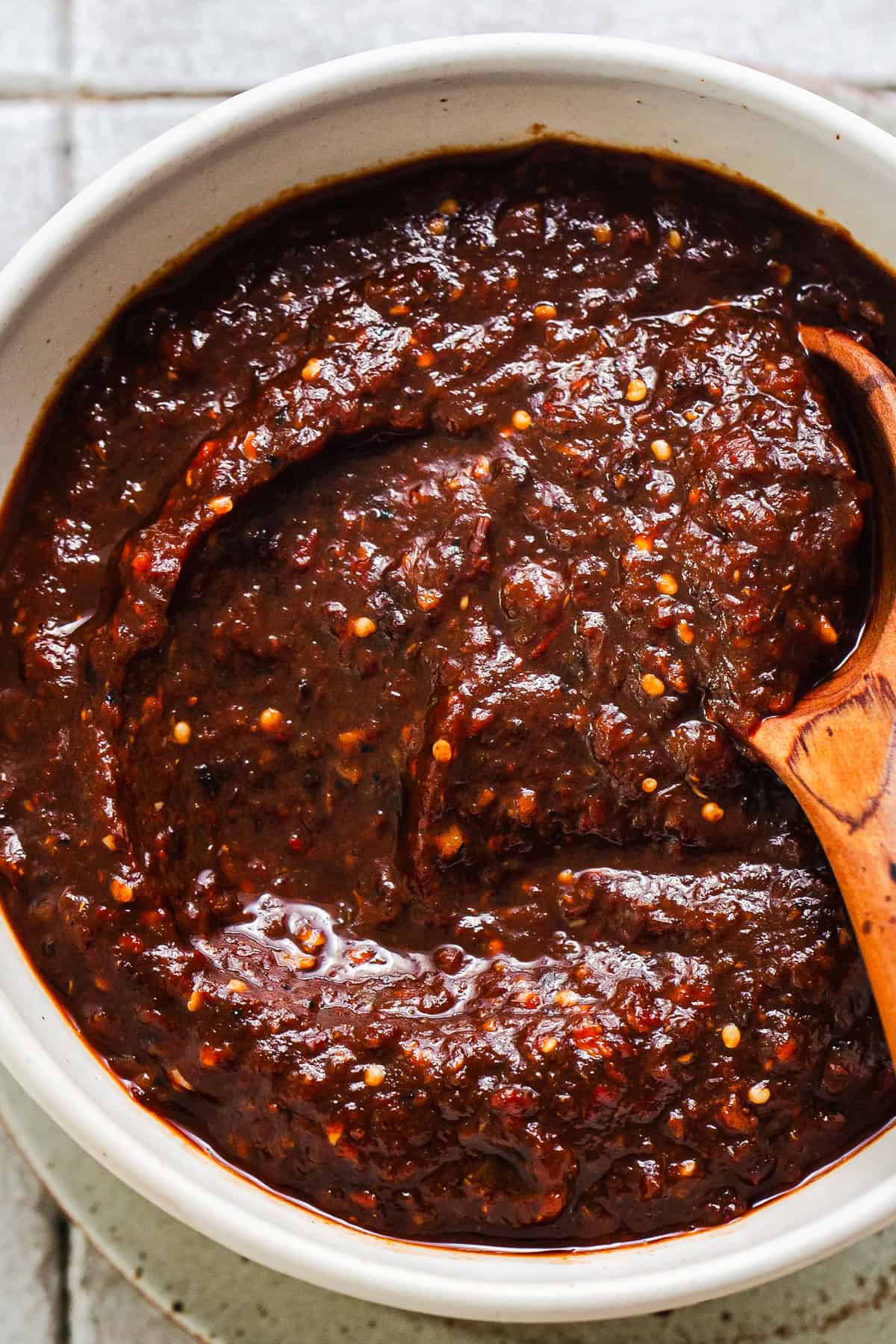 A close up of the salsa morita poured into a bowl.