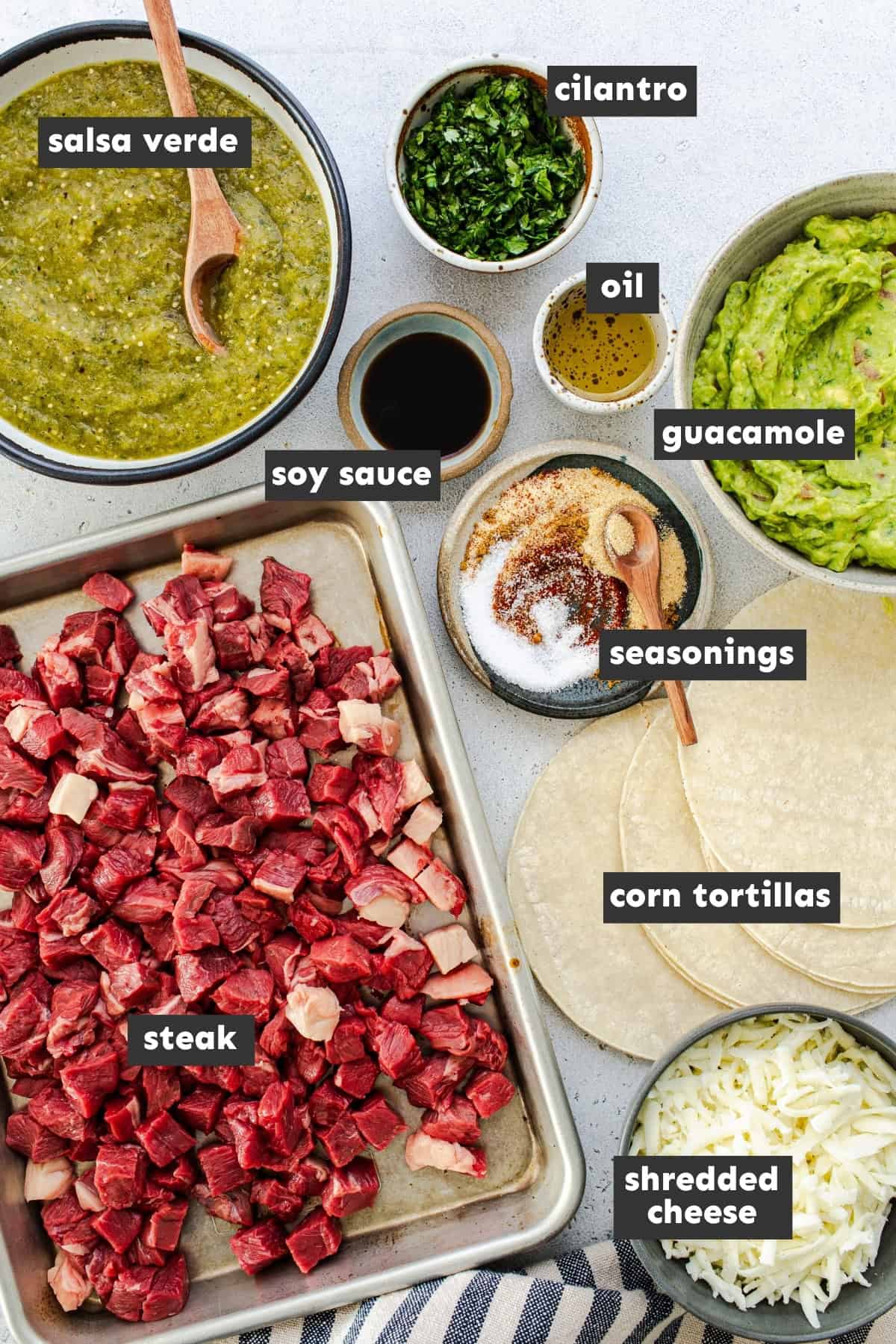 Ingredients for making vampiro tacos on a table.