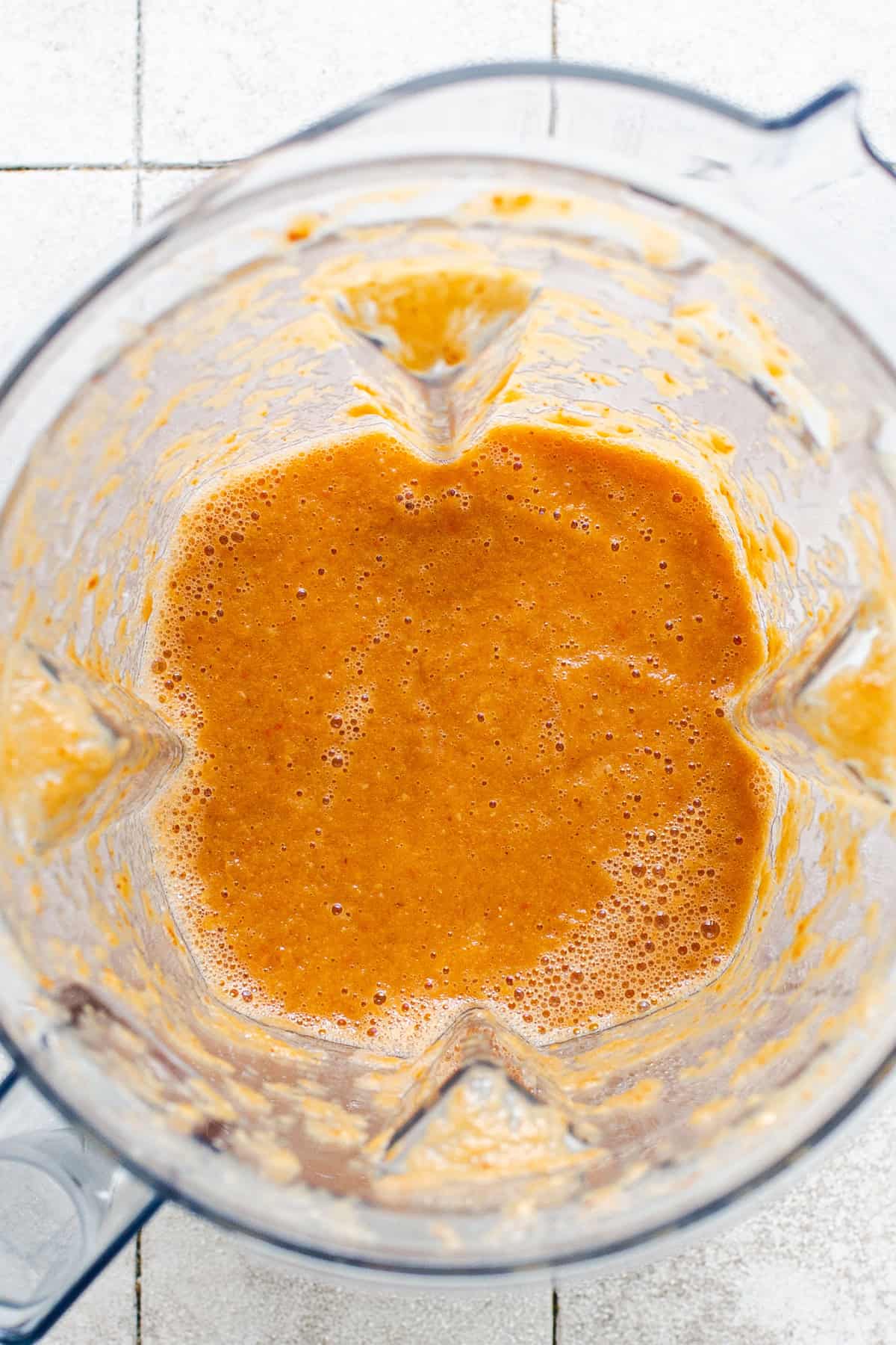 Blended salsa roja in a blender.