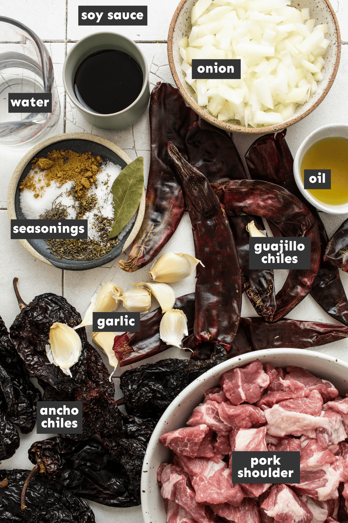 Ingredients for carne adovada, including dried ancho and guajillo chiles