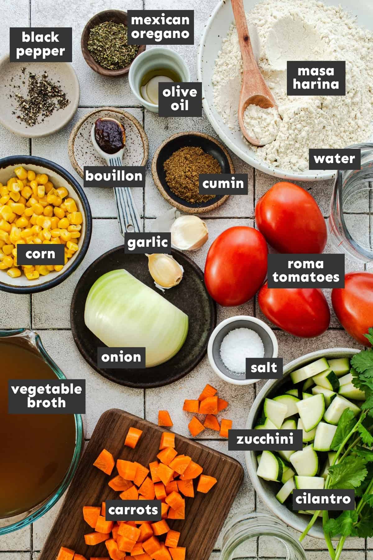 Ingredients needed to make chocoyotes in a vegetable soup on a table ready to be used.