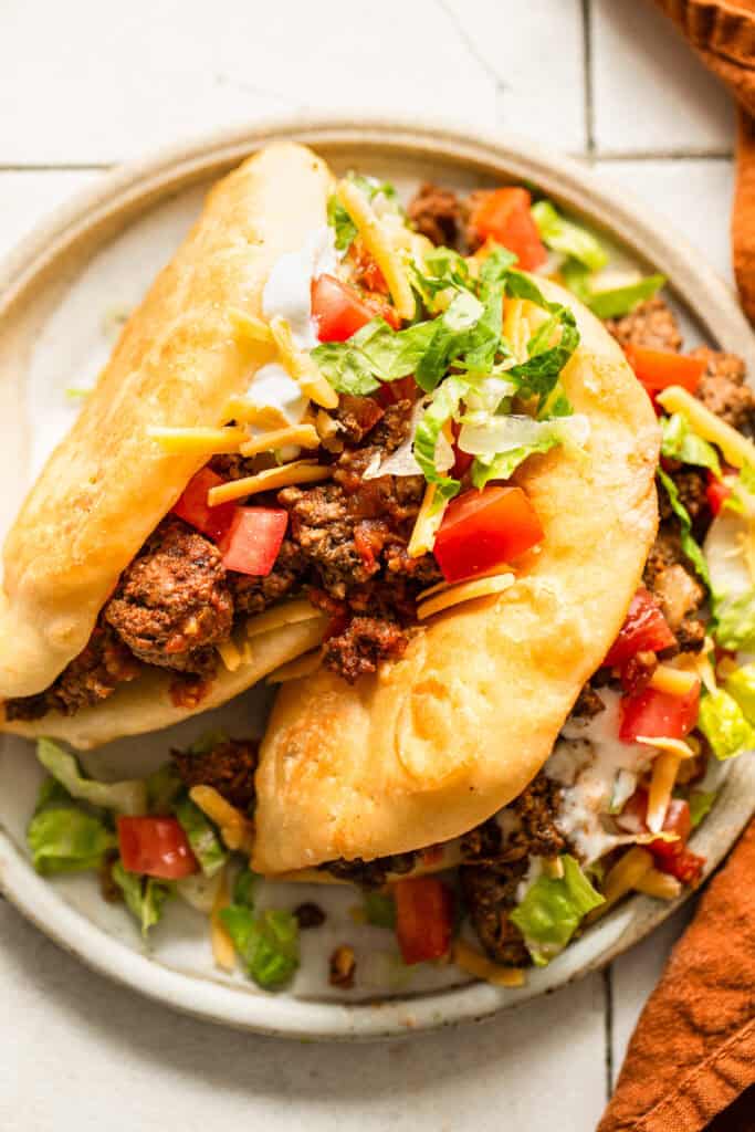 Homemade copycat Taco Bell chalupas on a plate ready to eat.