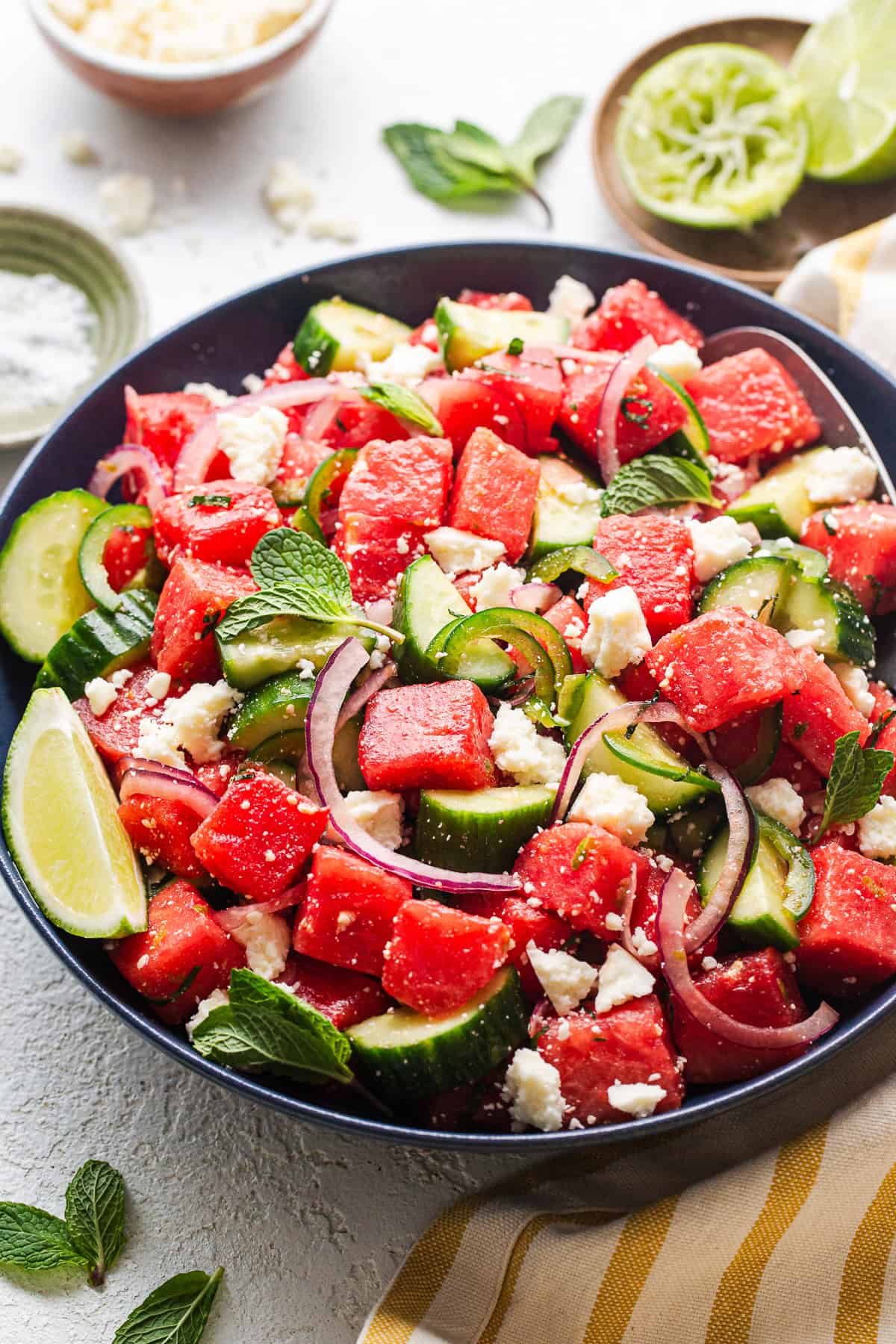 Watermelon salad, mexican-style, with cucumber, mint, cotija, lime juice, and jalapeño.
