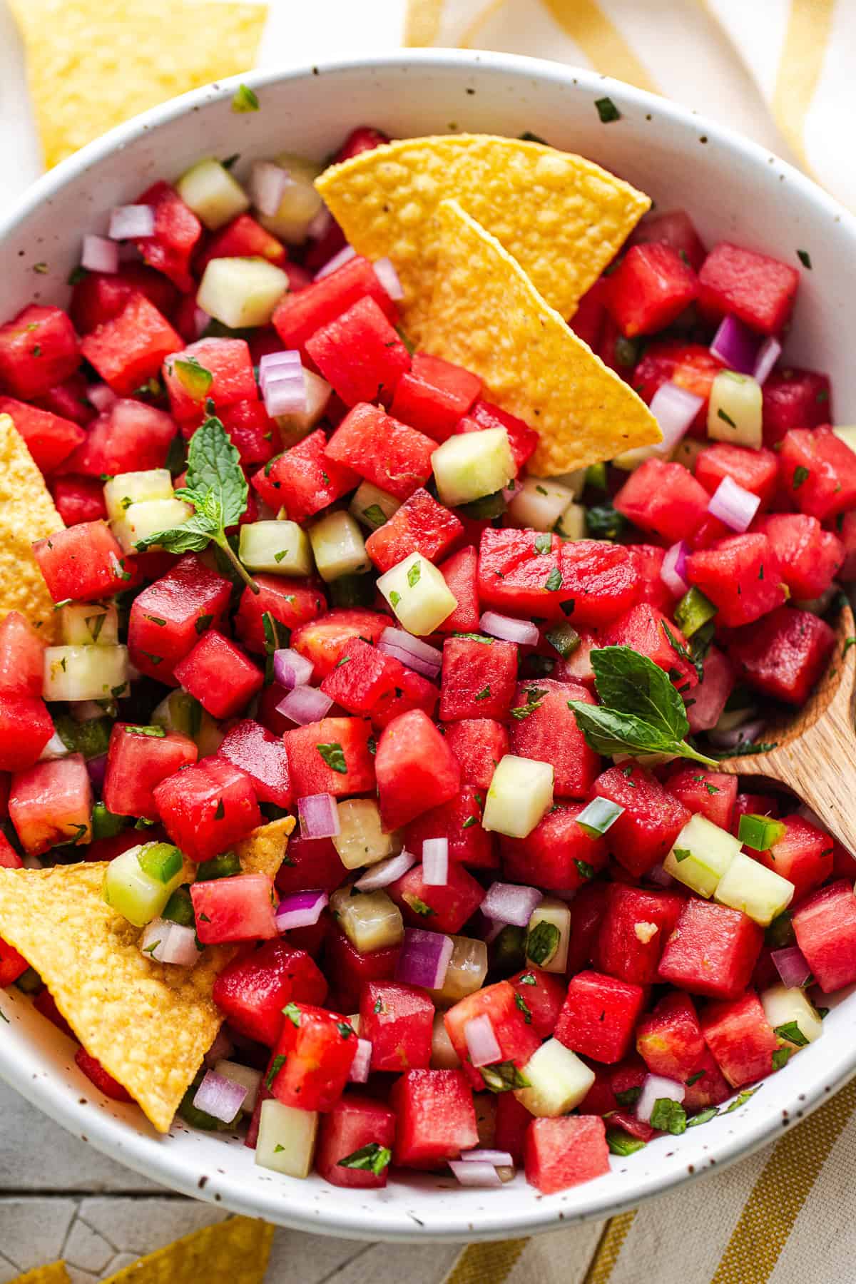 Overhead shot of easy watermelon salsa in a bowl with tortilla chips.