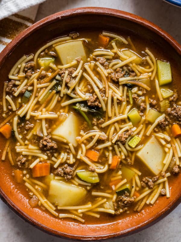 Sopa de fideo con carne molida in a bowl ready to serve.