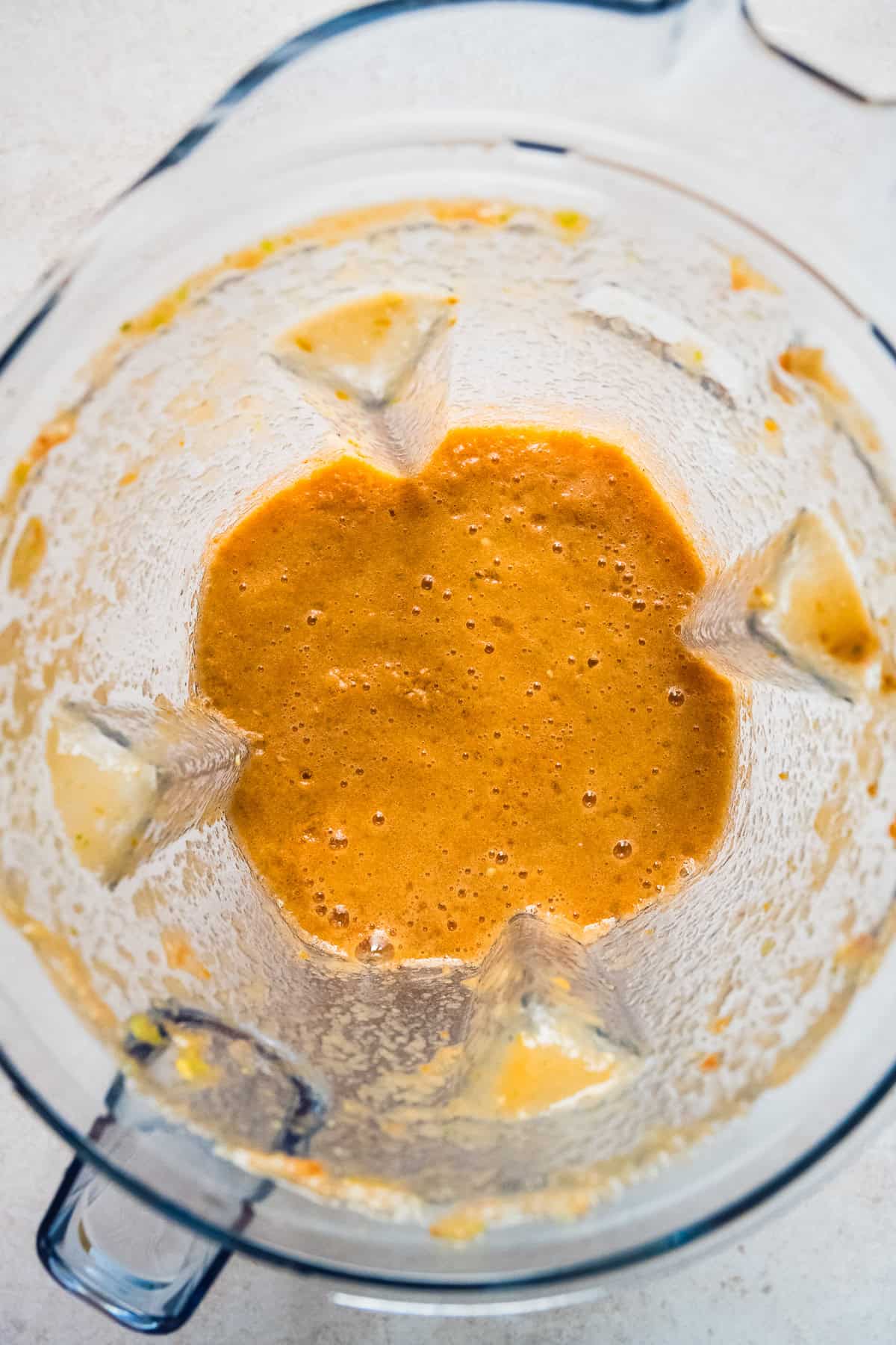 Blended tomato and onion broth in the blender.
