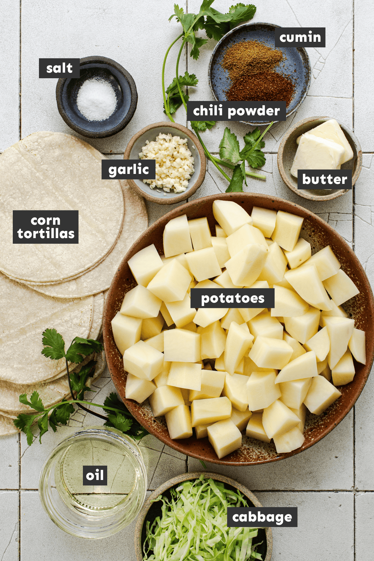 Ingredients for potato tacos, aka tacos de papa, on a table.